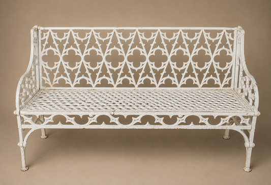 Heavy white gothic style cast iron bench with pierced back and seat