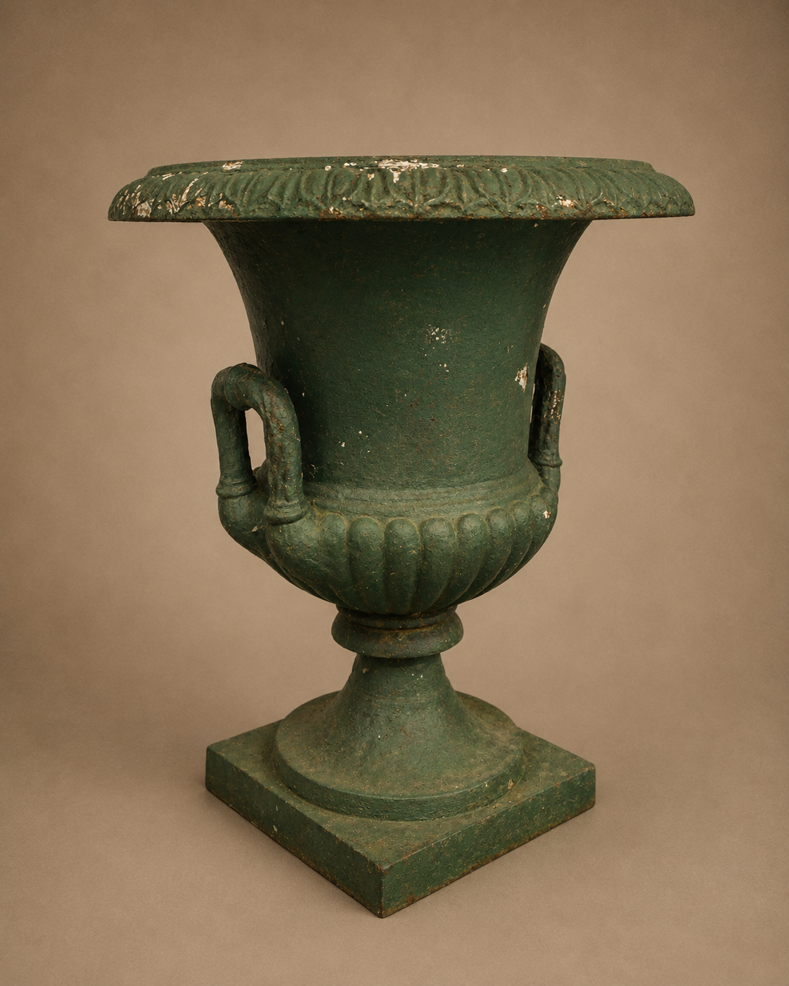 GARDEN: Cast iron urn, late 19th/20th C., Medici style urn painted green, acanthus leaf motif on