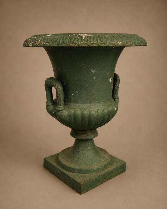 GARDEN: Cast iron urn, late 19th/20th C., Medici style urn painted green, acanthus leaf motif on