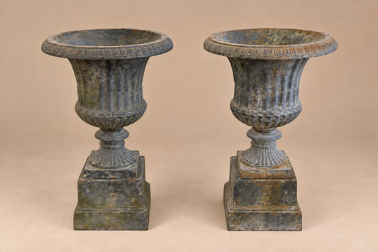 Pair of Cast Iron Campana Form Garden Urns on Pedestals