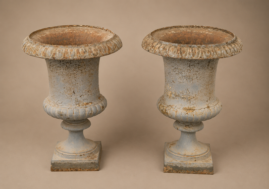 Pair of classical cast iron garden urns