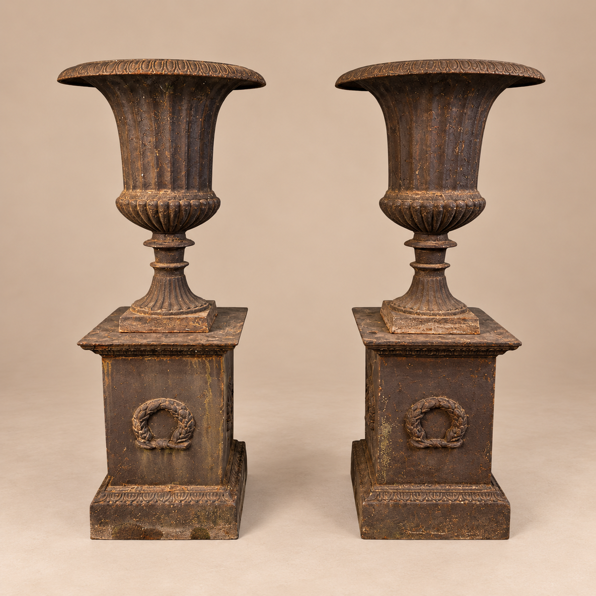 Pair of Classical Cast Iron Garden Urns on Pedestals with Wreath Motif
